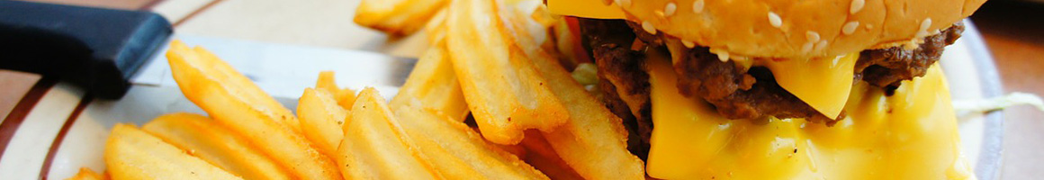 Eating American (Traditional) Burger at Lindburgers Delray Beach restaurant in Delray Beach, FL.
